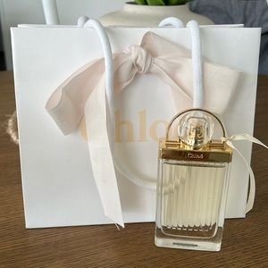 Barely used Chloe love story perfume. Sprayed a few times. Bag included.
